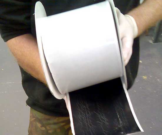 Wide single sided tape for reinforcement of corners and joints in Membranes