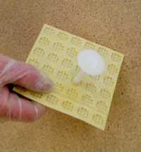 Mesh Membrane with plug, to take plaster or plasterboard on dabs of adhesive