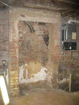 Basement conversion - kitchen wall and old chimney